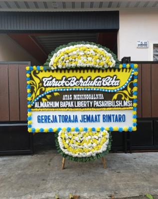 Papan Bunga Duka di Sakurjaya